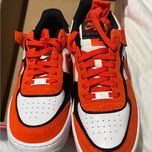 Nike Orange and White Sneakers with Iconic Design